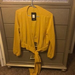 Fashion nova criss cross blouse NWT mustard color